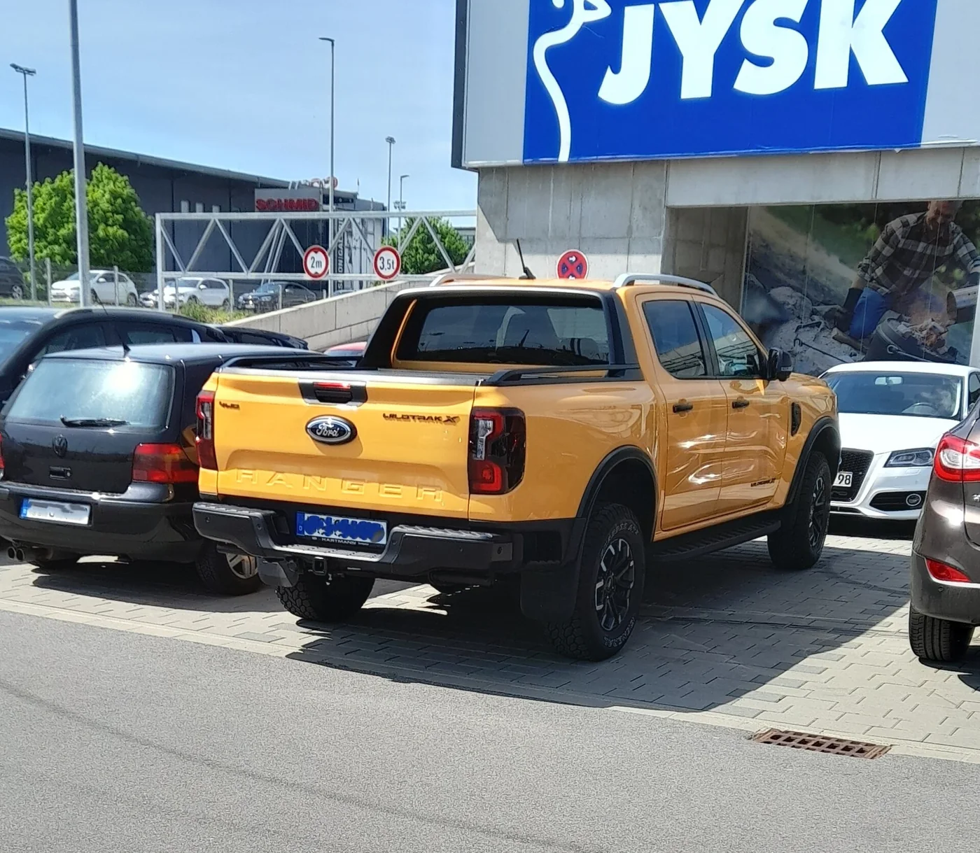 Stock current-generation Ford Ranger viewed from the rear