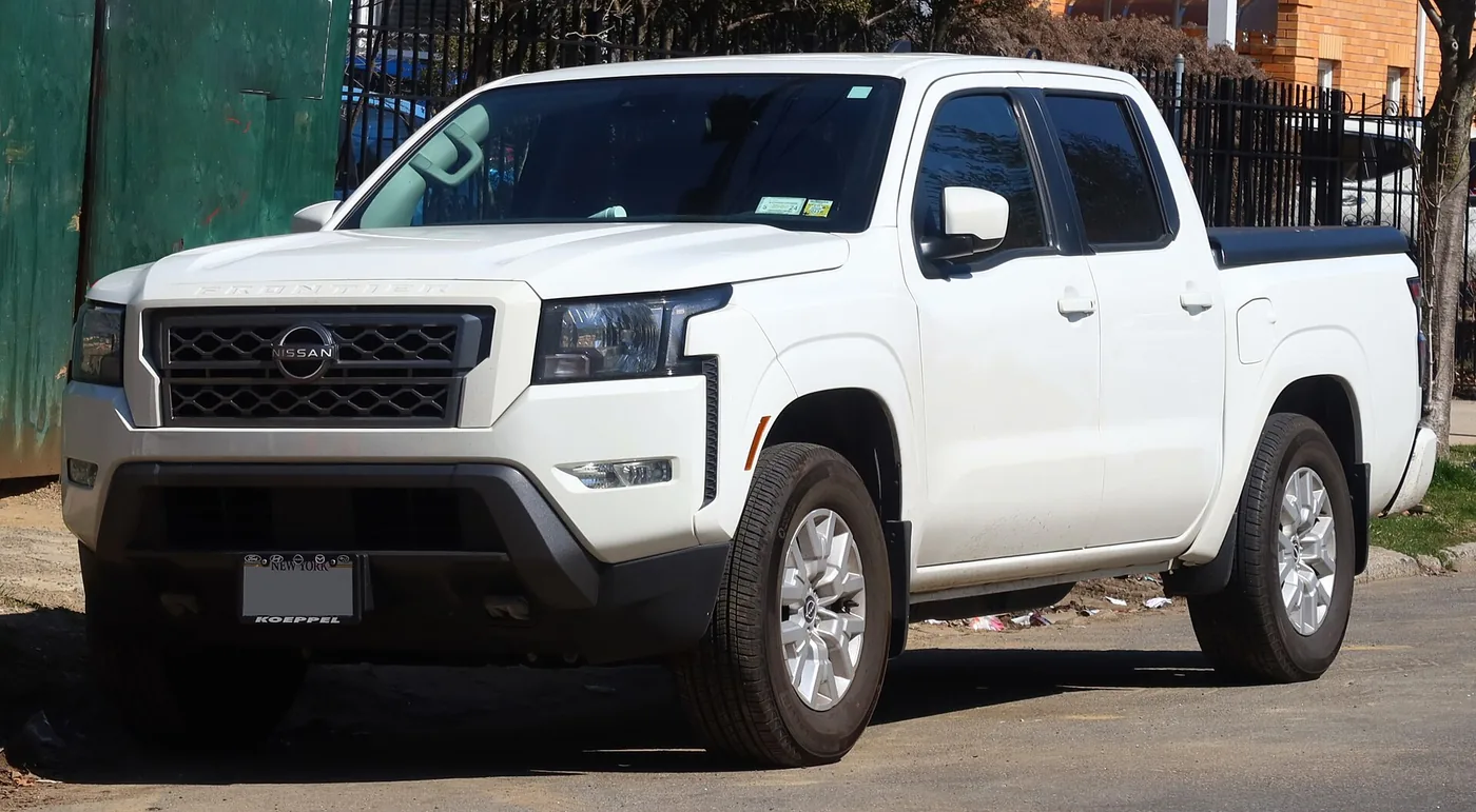 Stock third-generation Nissan Frontier crew cab viewed from the front